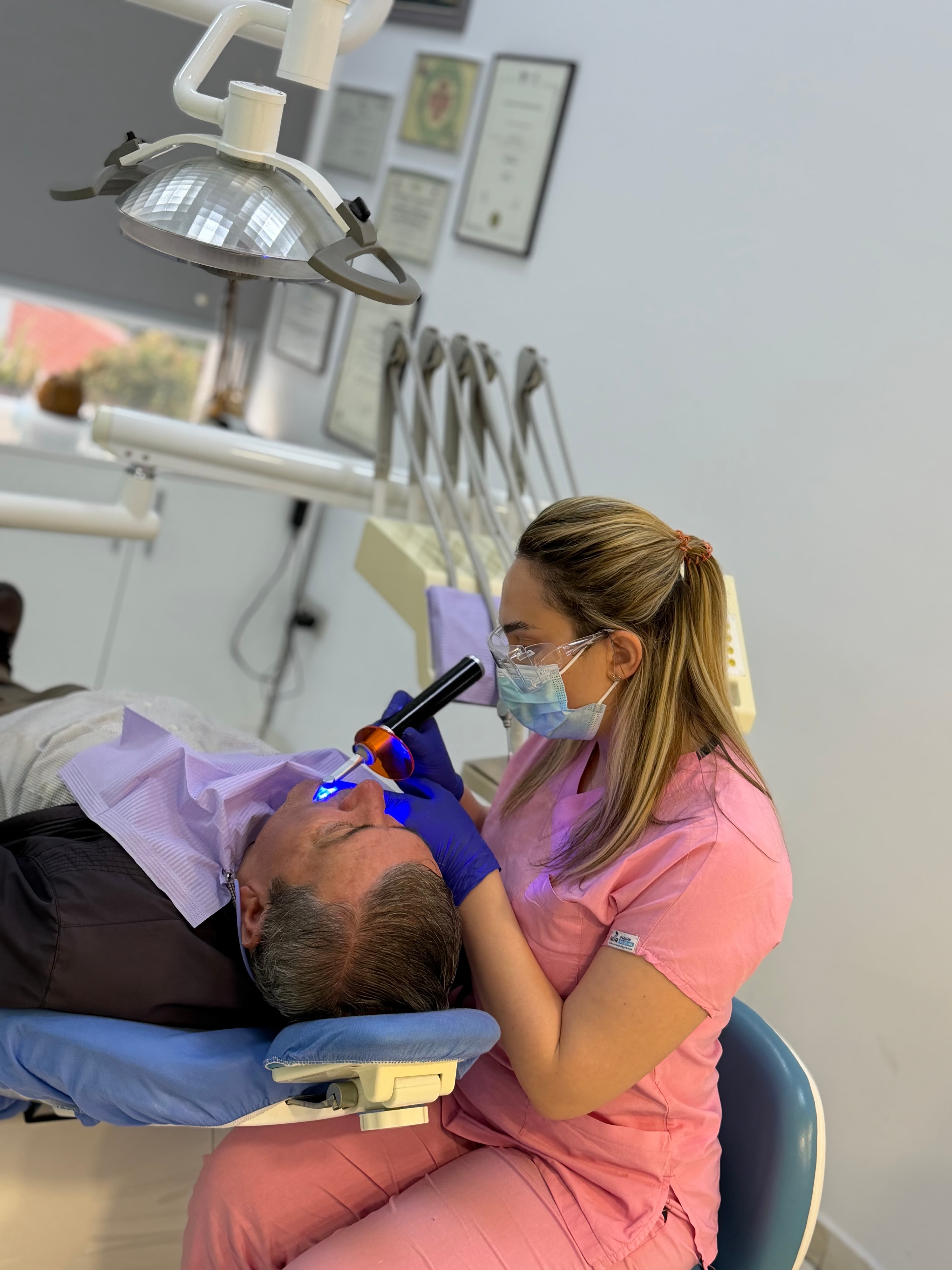 Doctor and smiling patient in modern clinic